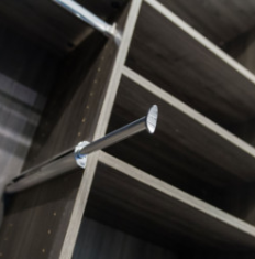 A telescoping valet rod is a good choice in closet design.