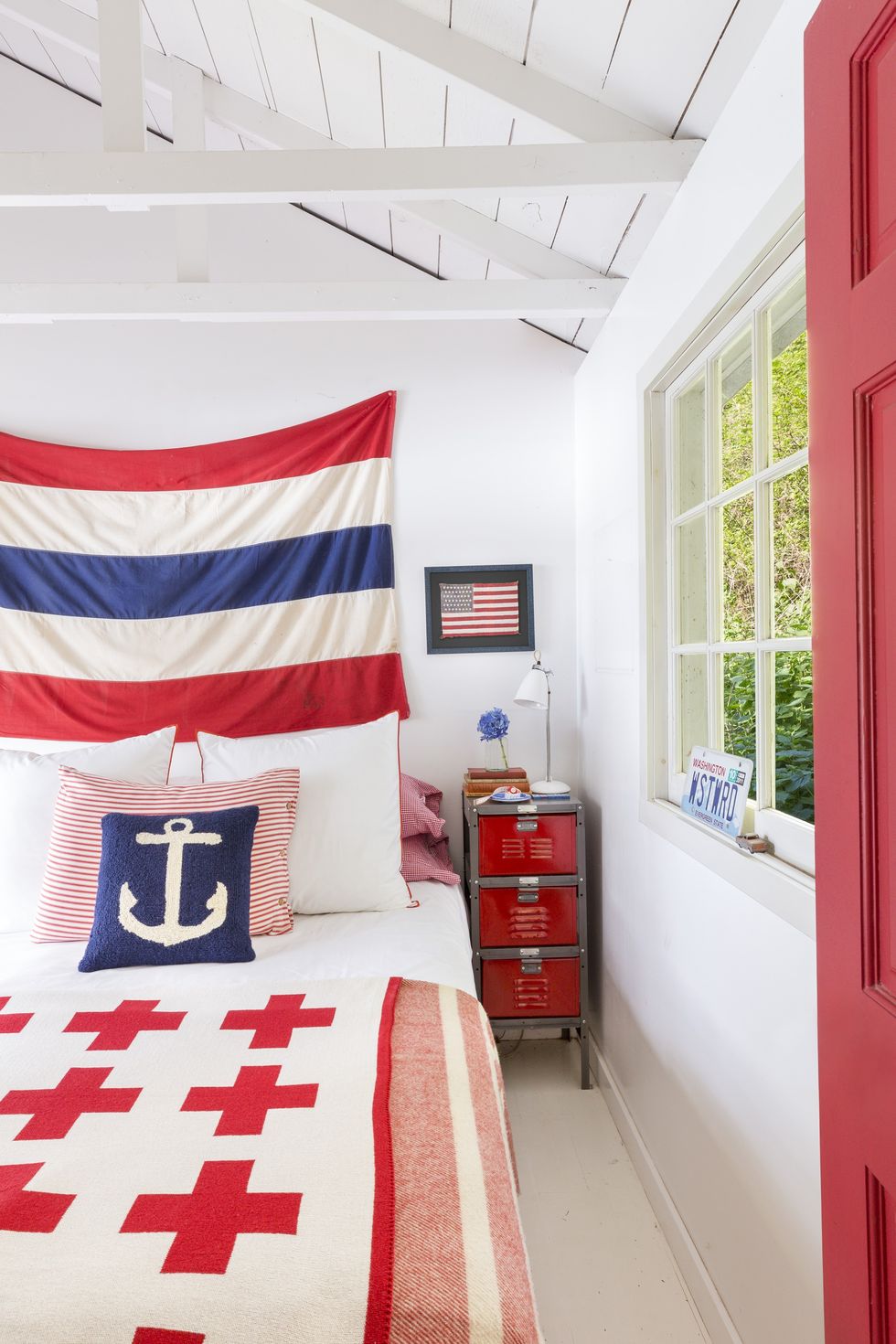 Bold colors can be used for coastal decor like this one with red, white and blue. Vivid colors for nautical decor